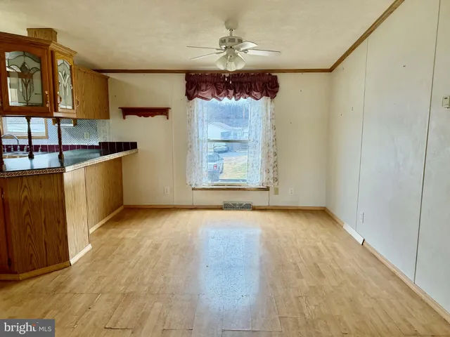 a view of livingroom with kitchen