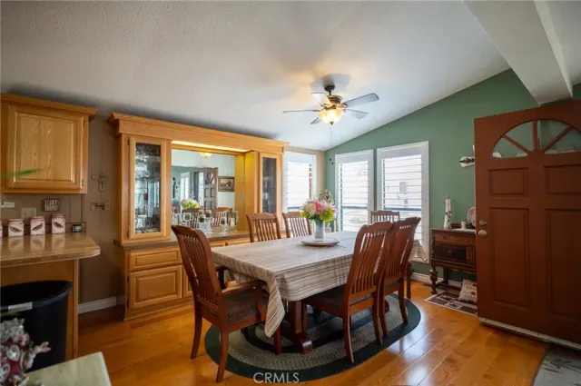 a kitchen with lots of counter top space and windows