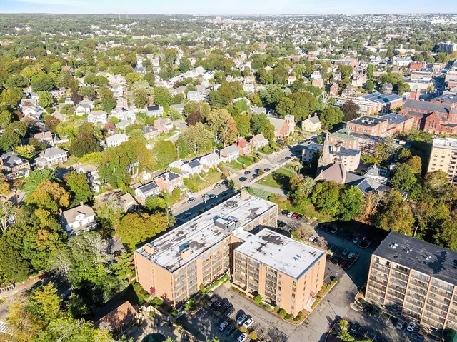 an aerial view of a city with lots of residential buildings