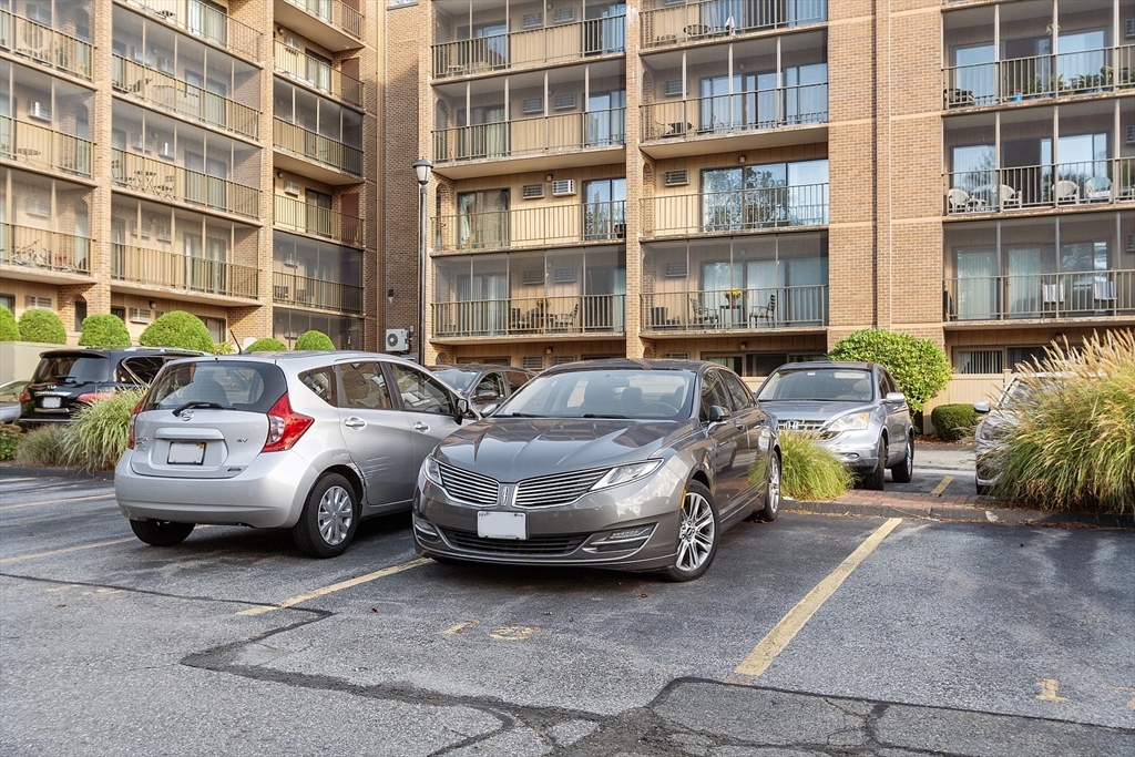 190 High Street, Unit 605 Medford, MA 02155 - Photo 34 of 37 a car parked in front of a building