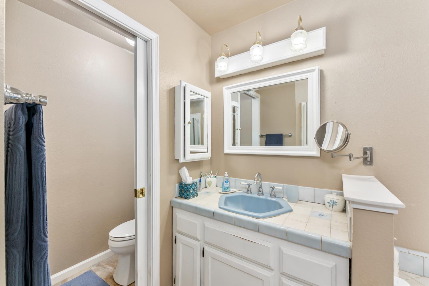 3472 See View Court Rescue, CA 95672 - Photo 34 of 56 a bathroom with a sink vanity granite and toilet