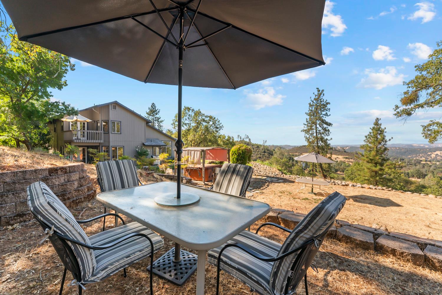 3472 See View Court Rescue, CA 95672 - Photo 45 of 56 a view of a terrace with furniture and stove