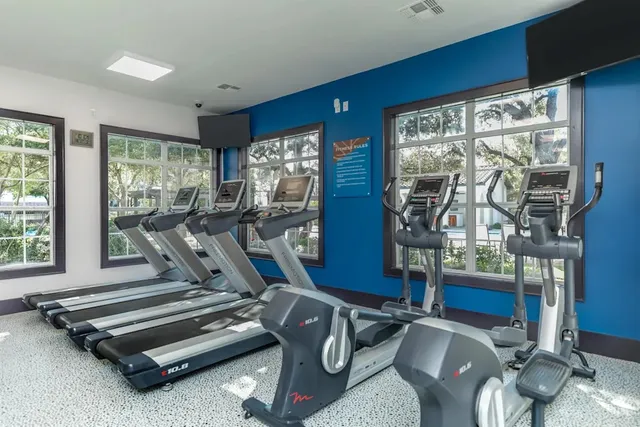 a view of a room with gym equipment