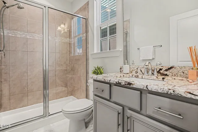 a view of house with a yard and deck