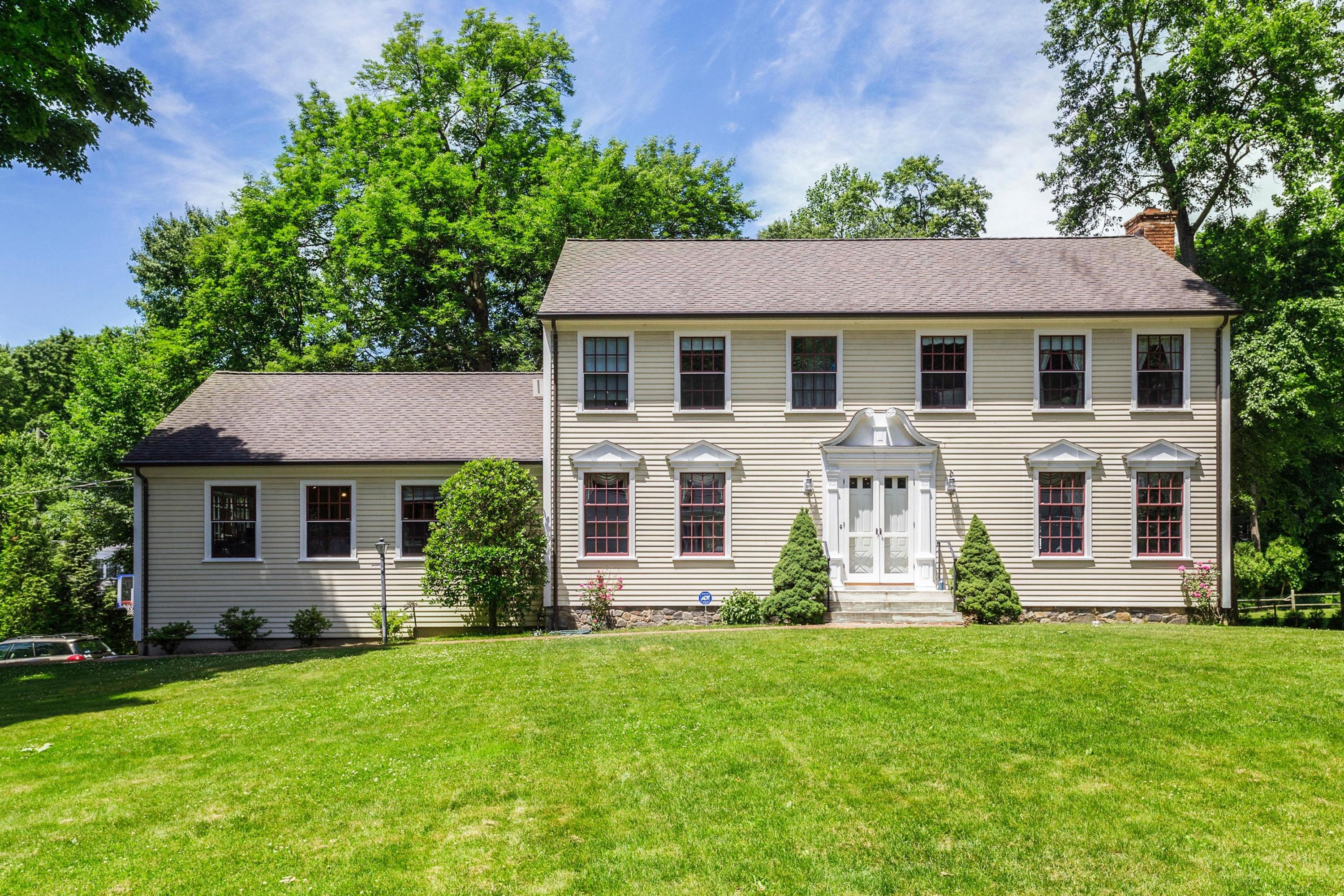 34 Country Club Road Darien, CT 06820 - Photo 1 of 17 front view of a house with a yard