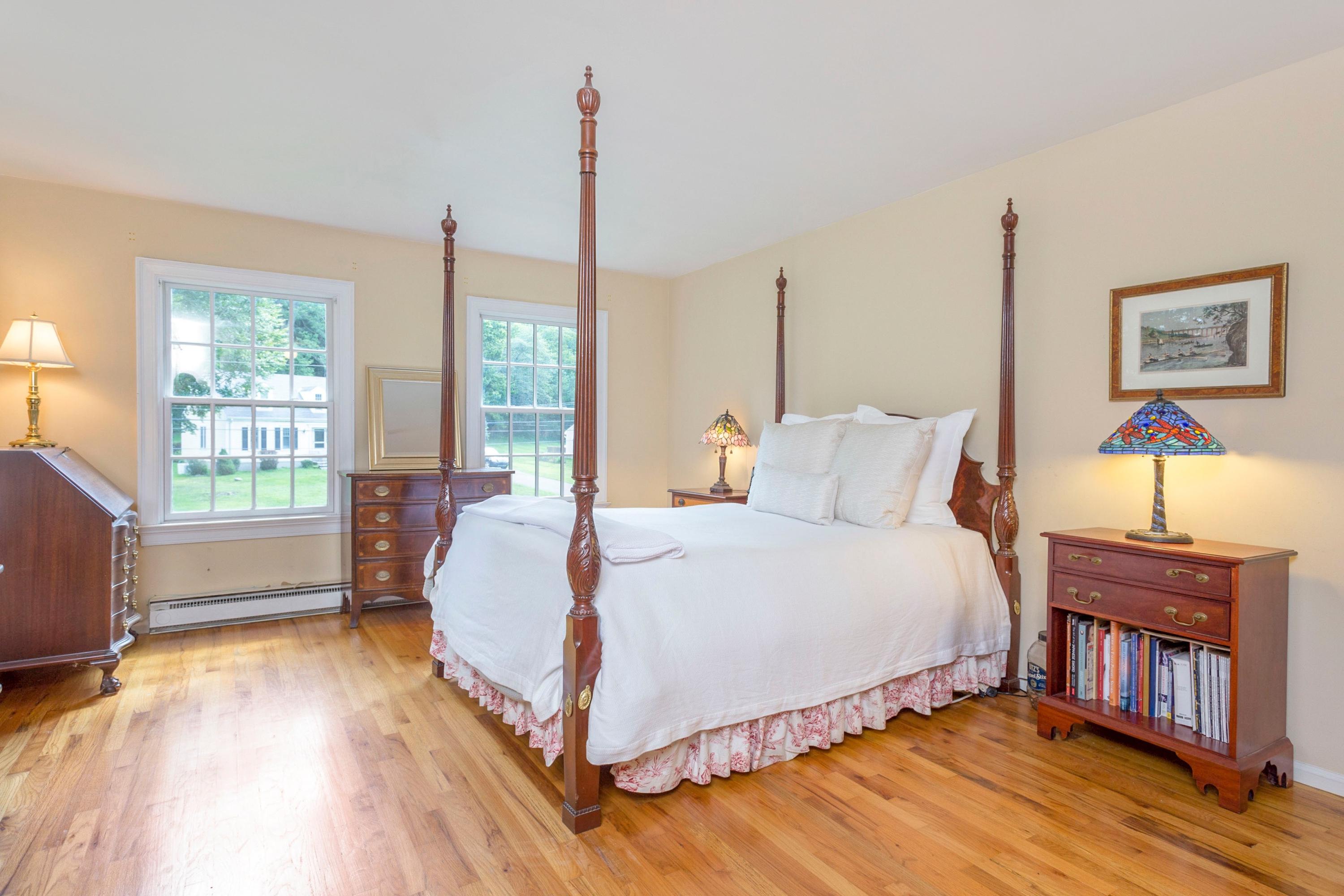 34 Country Club Road Darien, CT 06820 - Photo 13 of 17 a bed room with a bed and a window