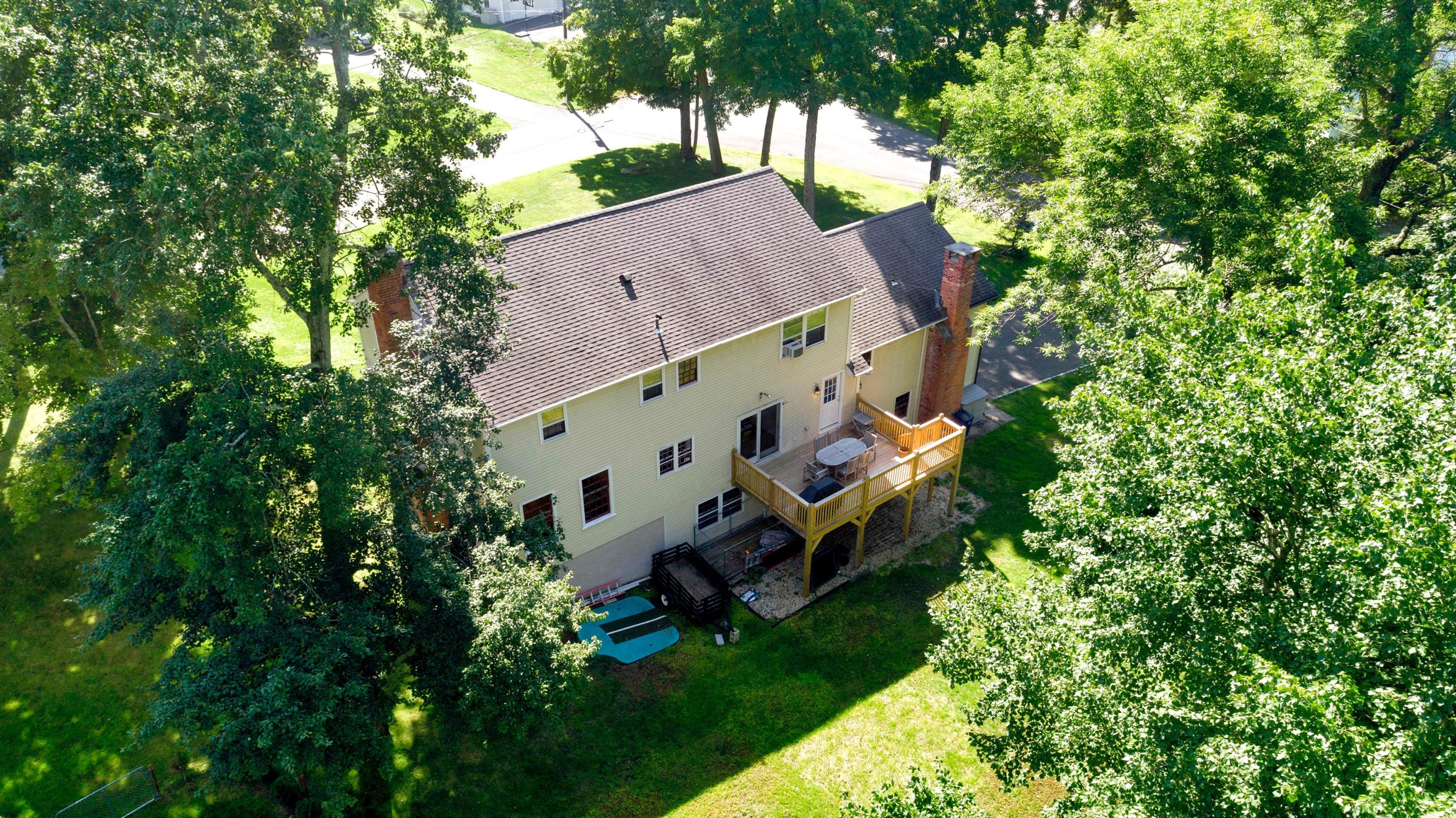 34 Country Club Road Darien, CT 06820 - Photo 16 of 17 front view of a house with a yard