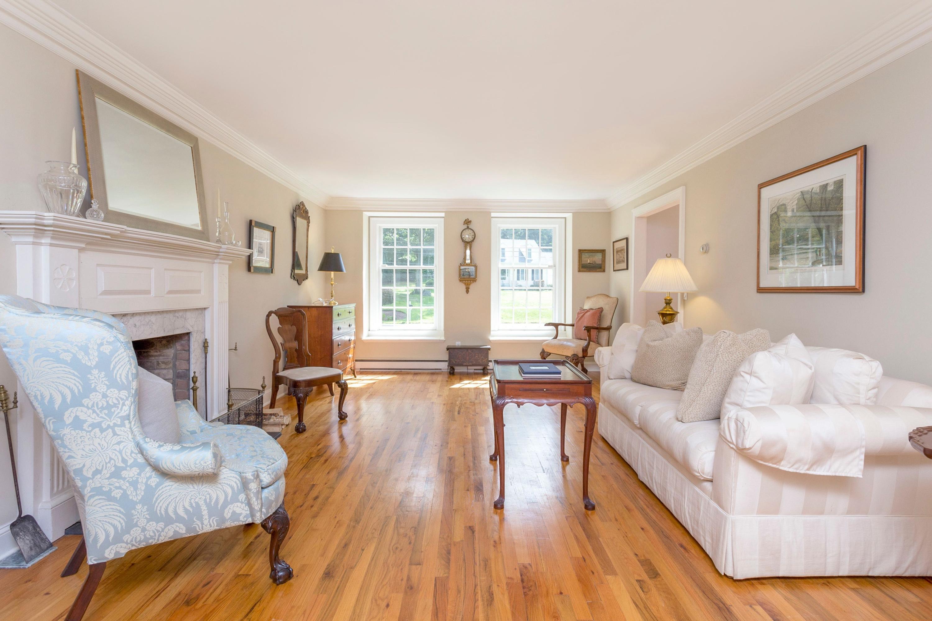 34 Country Club Road Darien, CT 06820 - Photo 3 of 17 a living room with furniture and a fireplace