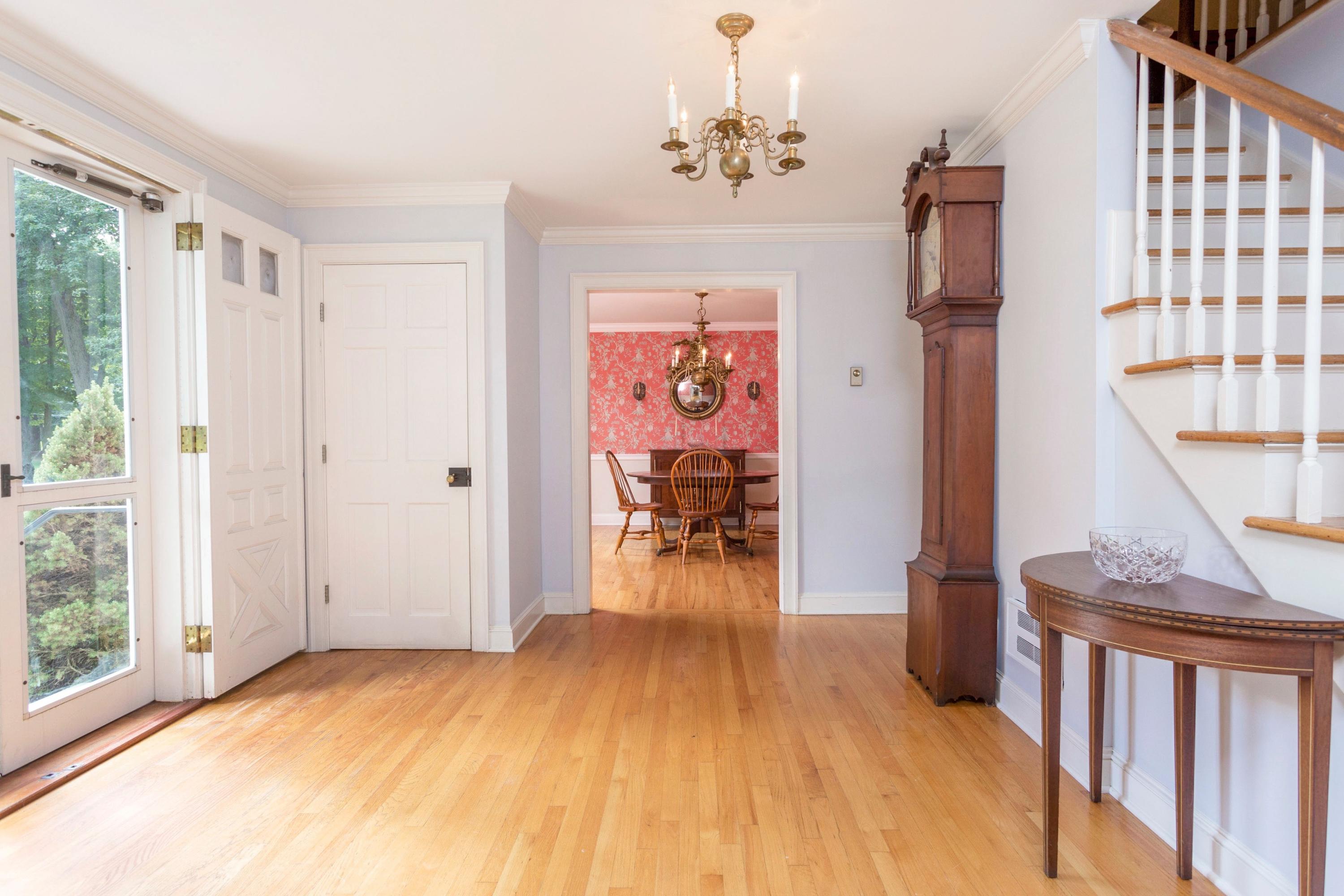 34 Country Club Road Darien, CT 06820 - Photo 5 of 17 a view of a livingroom with wooden floor and furniture