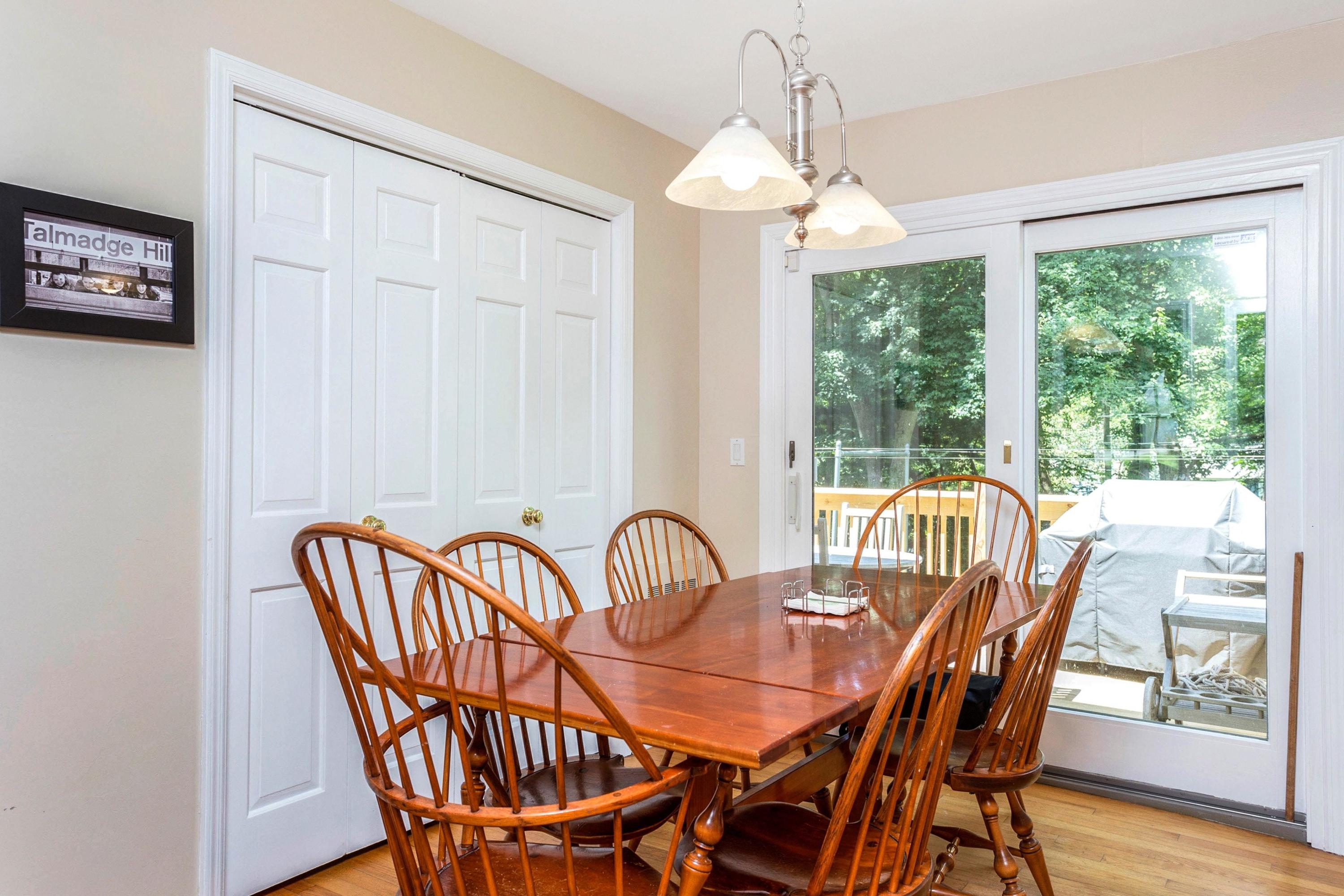 34 Country Club Road Darien, CT 06820 - Photo 8 of 17 a view of a dining room with furniture window and wooden floor