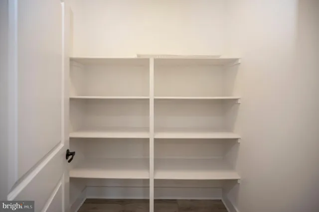 a view of room with hardwood floor