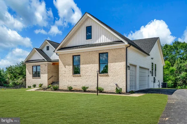 a front view of house with yard