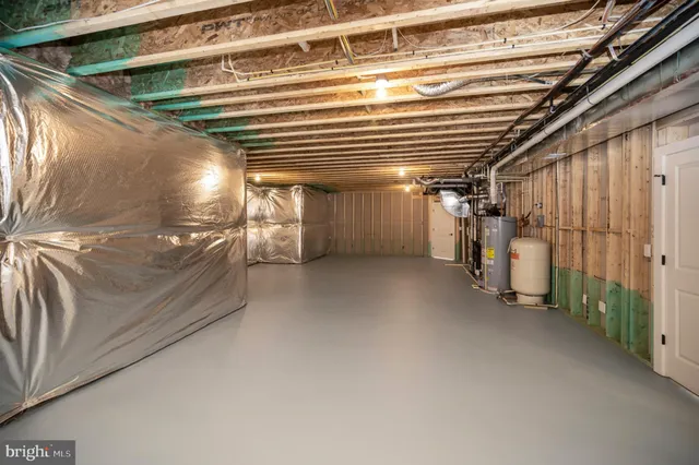 a view of entryway with wooden floor and stairs
