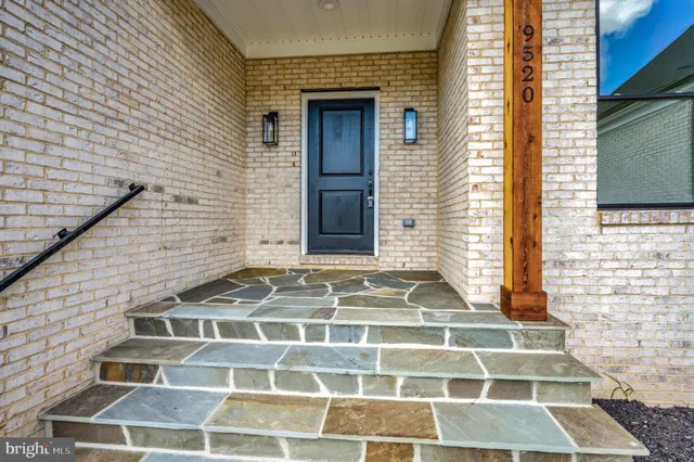 a view of a brick house with a window