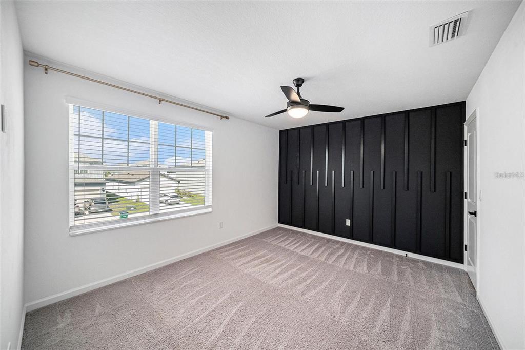 35542 Buttonweed Trail Zephyrhills, FL 33541 - Photo 14 of 30 a view of an empty room with a window