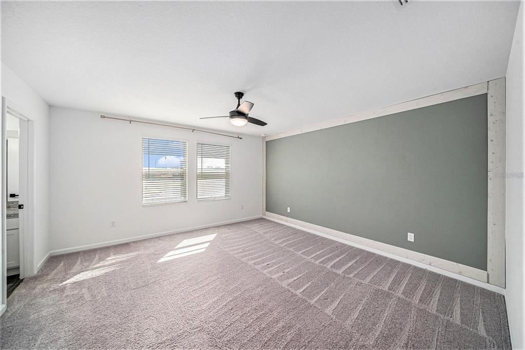 35542 Buttonweed Trail Zephyrhills, FL 33541 - Photo 16 of 30 a view of an empty room with a window