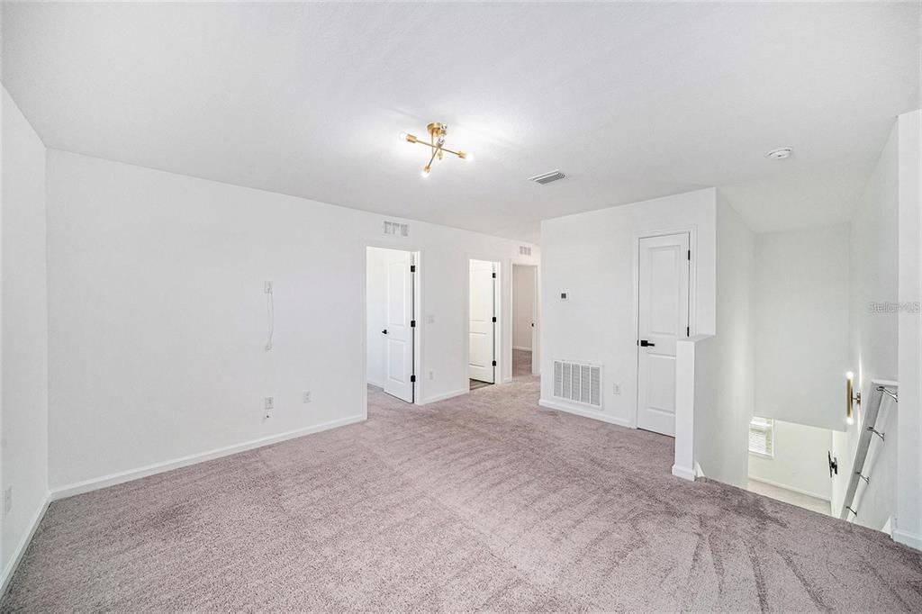 35542 Buttonweed Trail Zephyrhills, FL 33541 - Photo 9 of 30 a view of an empty room