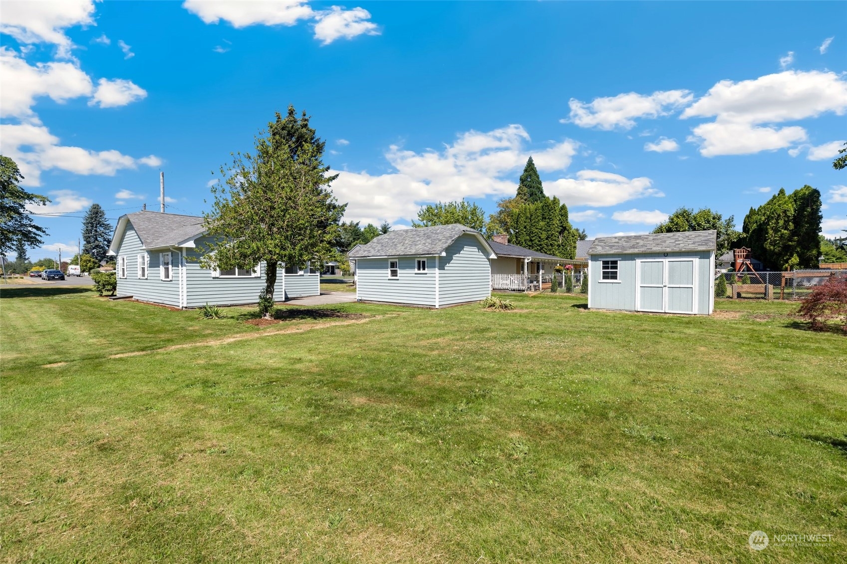 1918 McHugh Avenue Enumclaw, WA 98022 - Photo 15 of 16 a house view with a garden space