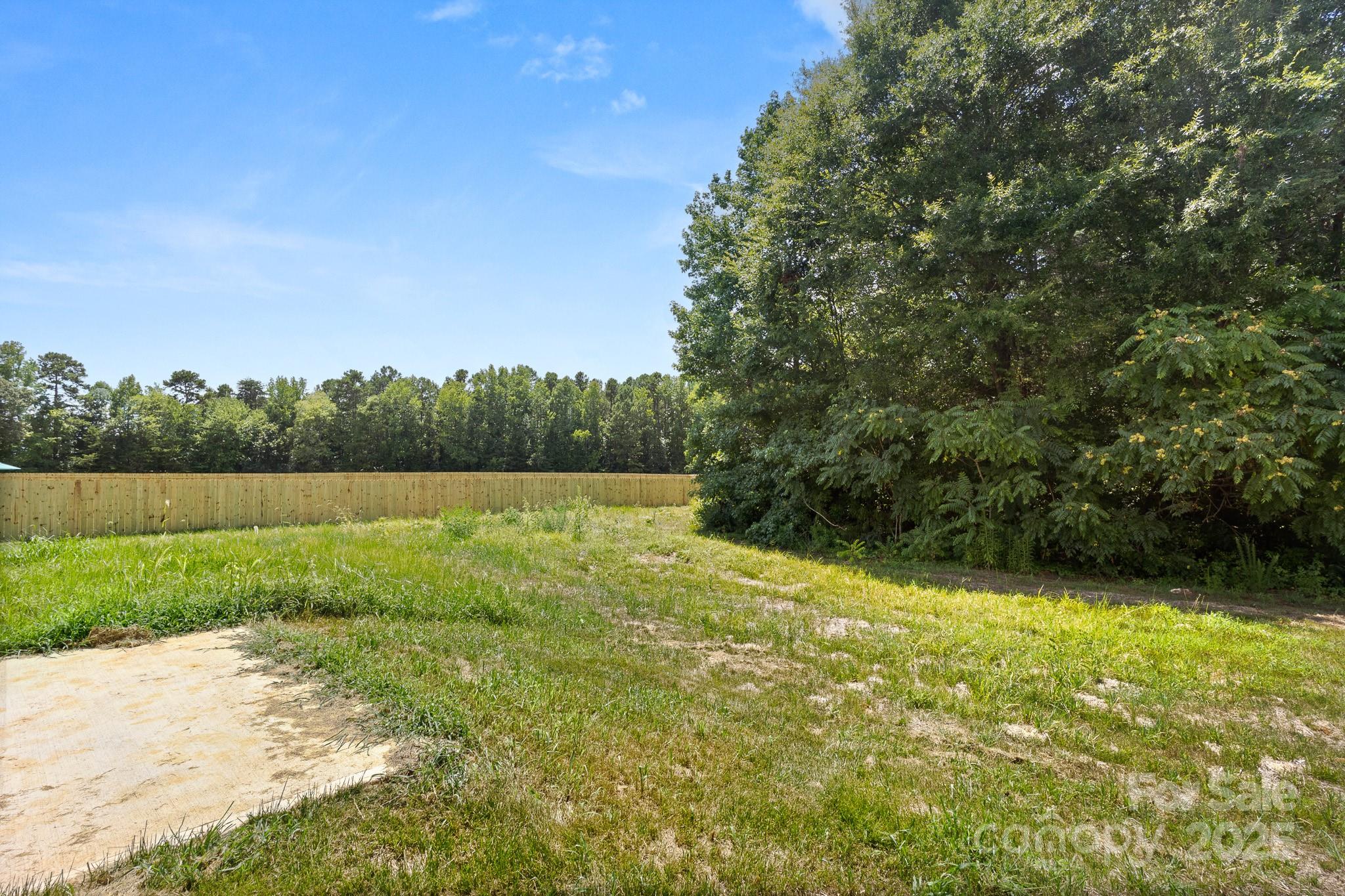 6122 Lowder Road Salisbury, NC 28147 - Photo 27 of 31 a view of a garden with large trees