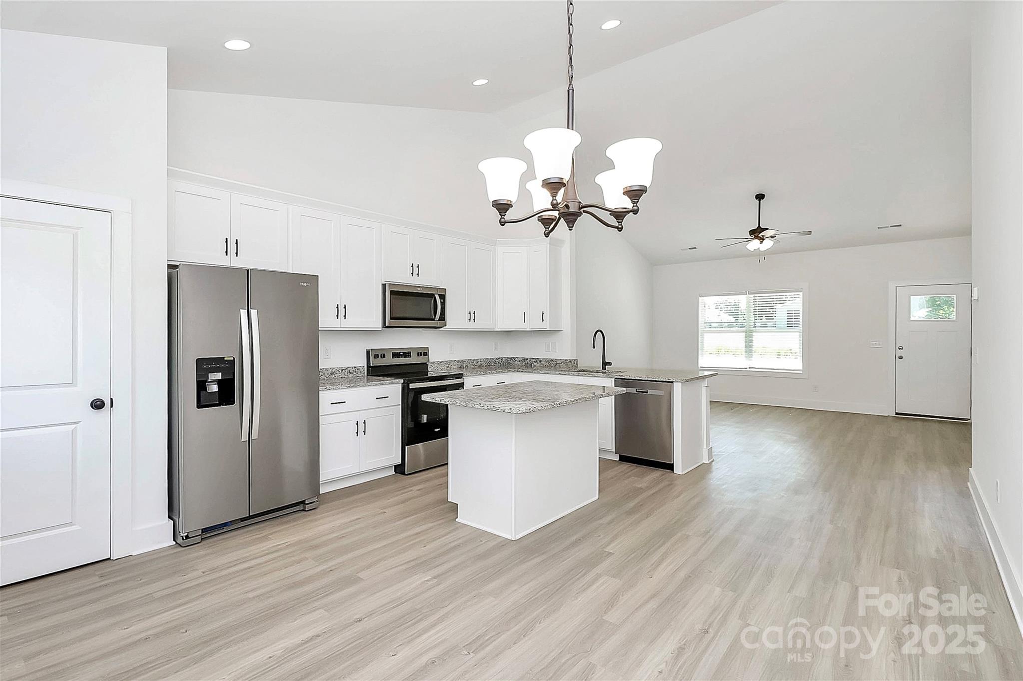 6122 Lowder Road Salisbury, NC 28147 - Photo 10 of 31 a view of a kitchen with a sink a refrigerator and window