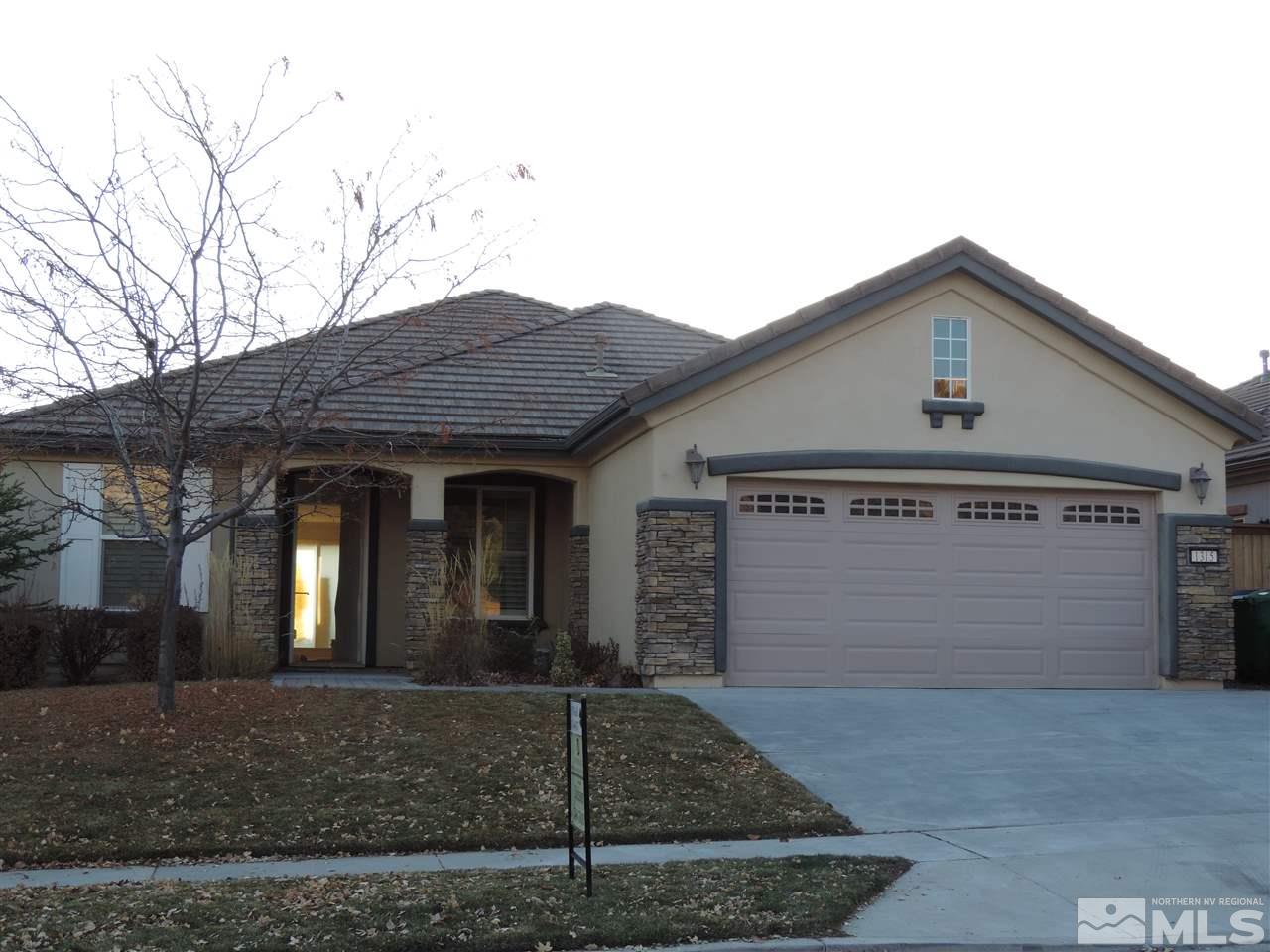 1315 Tarleton Way Reno, NV 89523 - Photo 2 of 2 a front view of a house with garage