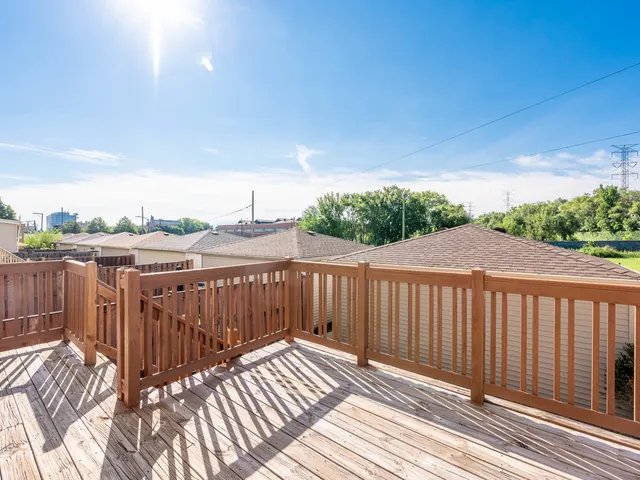 a view of a wooden roof deck