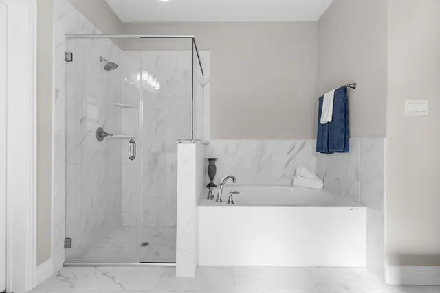 a bedroom with a bed and a cabinets