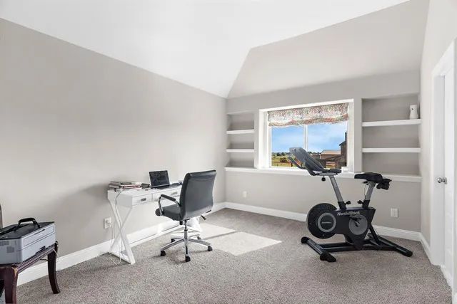 a en suite bathroom with double sink and a mirror