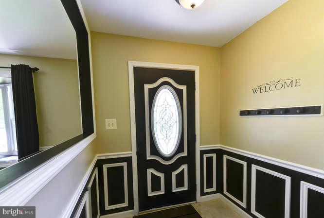 5918 Atteentee Road Springfield, VA 22150 - Photo 3 of 25 a front view of a house with entrance