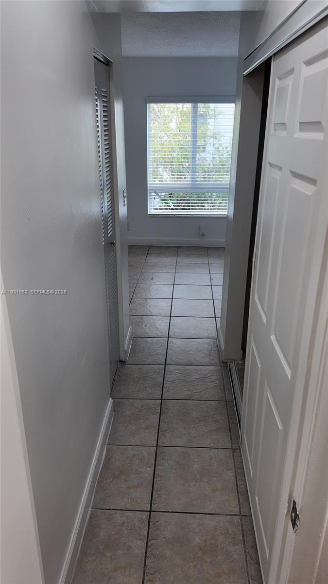 11120 Southwest 196th Street, Unit 201 Cutler Bay, FL 33157 - Photo 15 of 18 a view of gallery with window