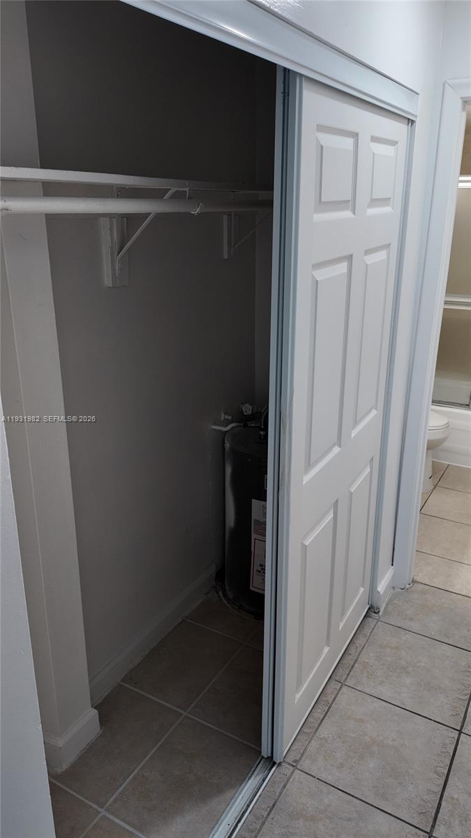 11120 Southwest 196th Street, Unit 201 Cutler Bay, FL 33157 - Photo 16 of 18 a view of closet