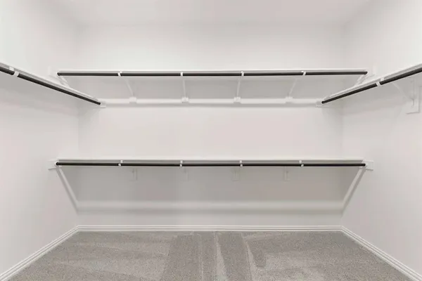 a view of small space with racks on the wall