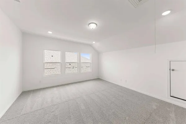 a view of an empty room with a sink