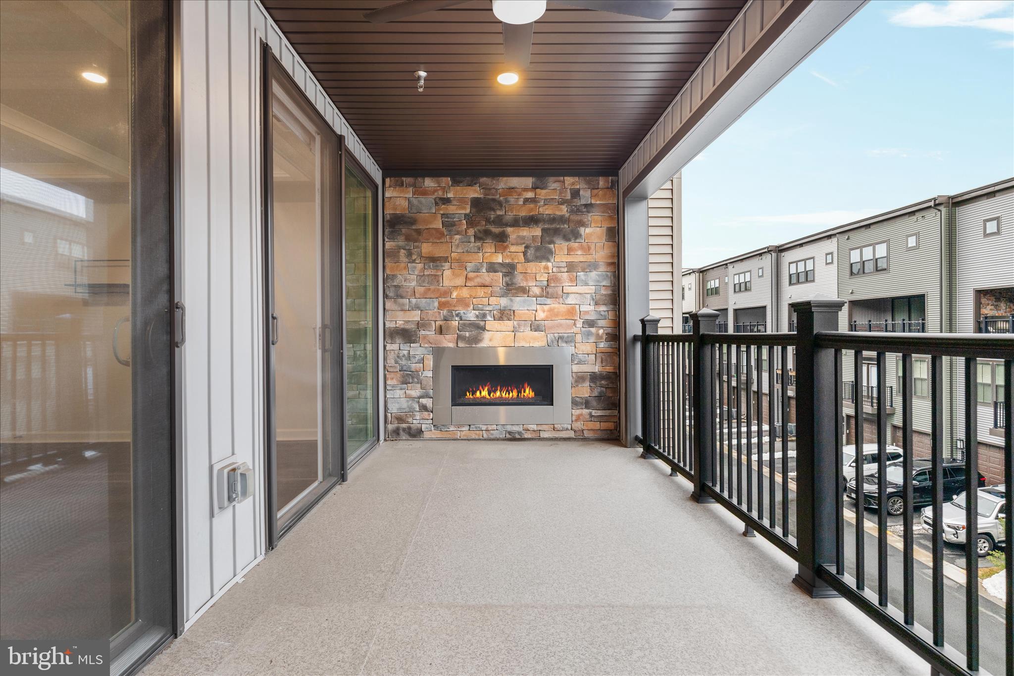 12910 Sunrise Ridge Alley, Unit 60 Herndon, VA 20171 - Photo 7 of 45 Balcony with fireplace