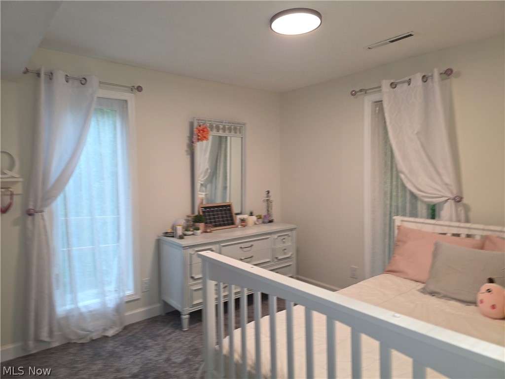 2868 Shade Road Akron, OH 44333 - Photo 31 of 49 Room featuring light wall paint and neutral-toned carpeting