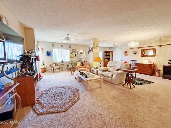 a living room with furniture and a view of living room