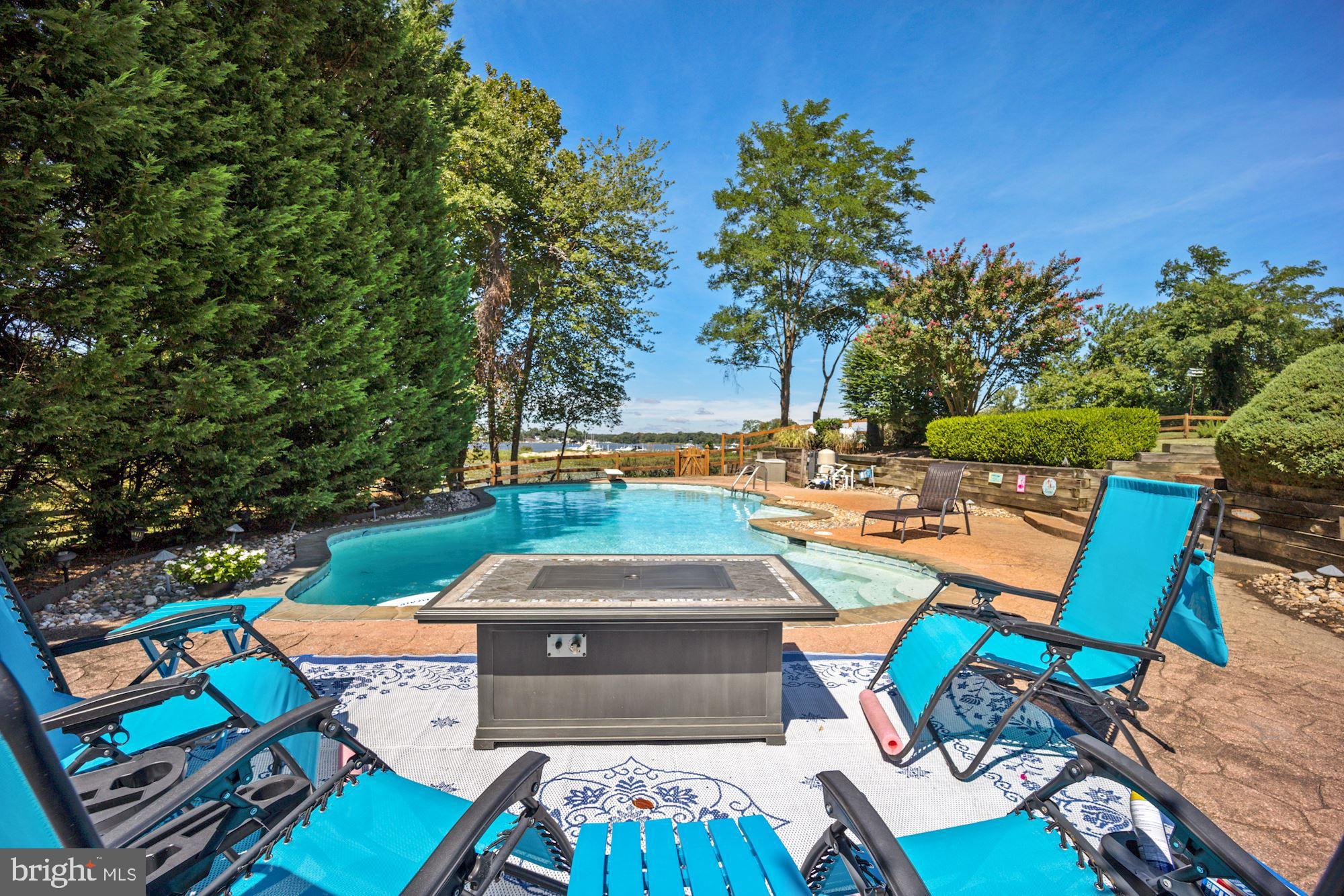 8100 Pinehurst Harbour Way Pasadena, MD 21122 - Photo 25 of 70 Entertain and relax poolside