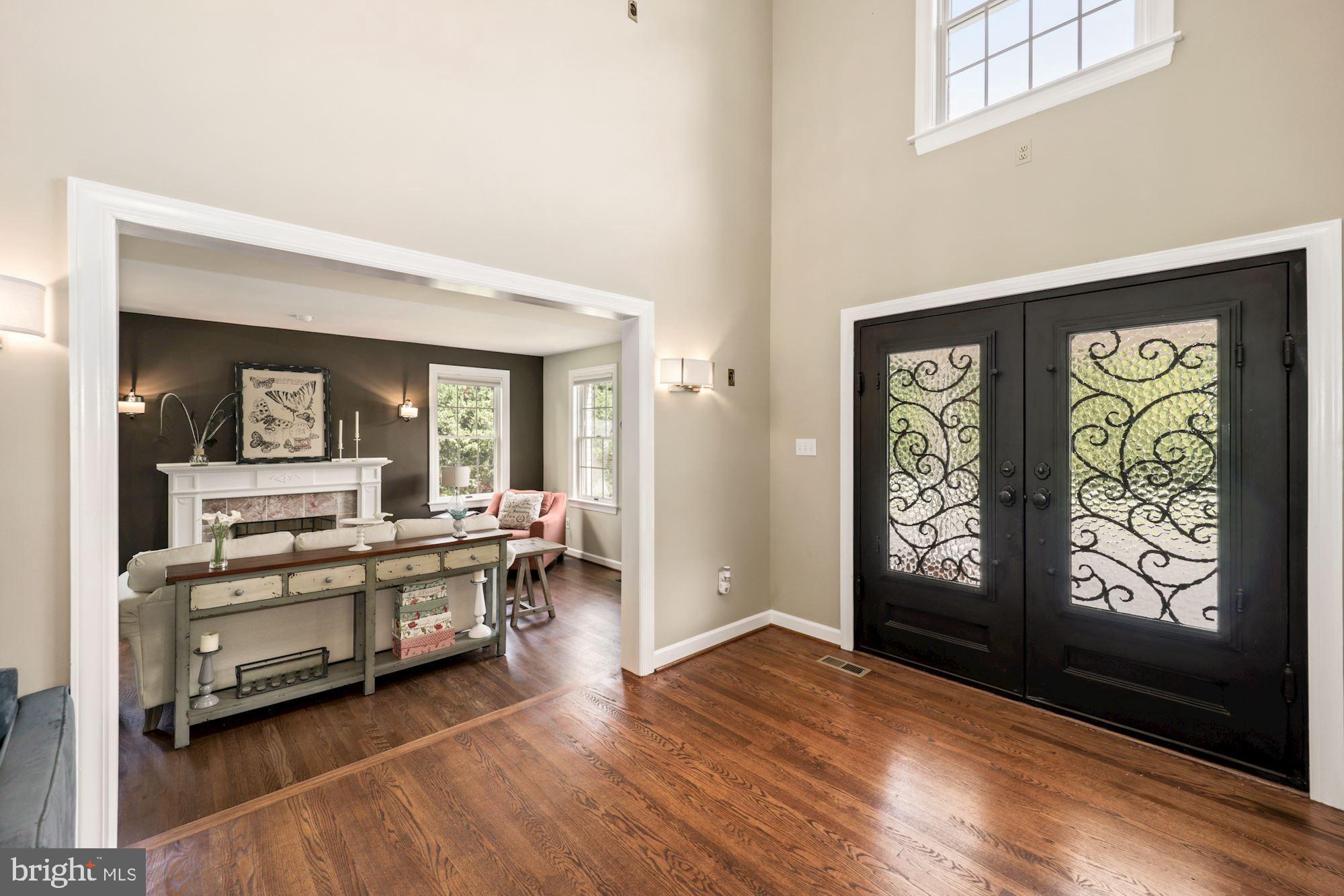 8100 Pinehurst Harbour Way Pasadena, MD 21122 - Photo 29 of 70 Center Hall with fabulous entry doors, den to side