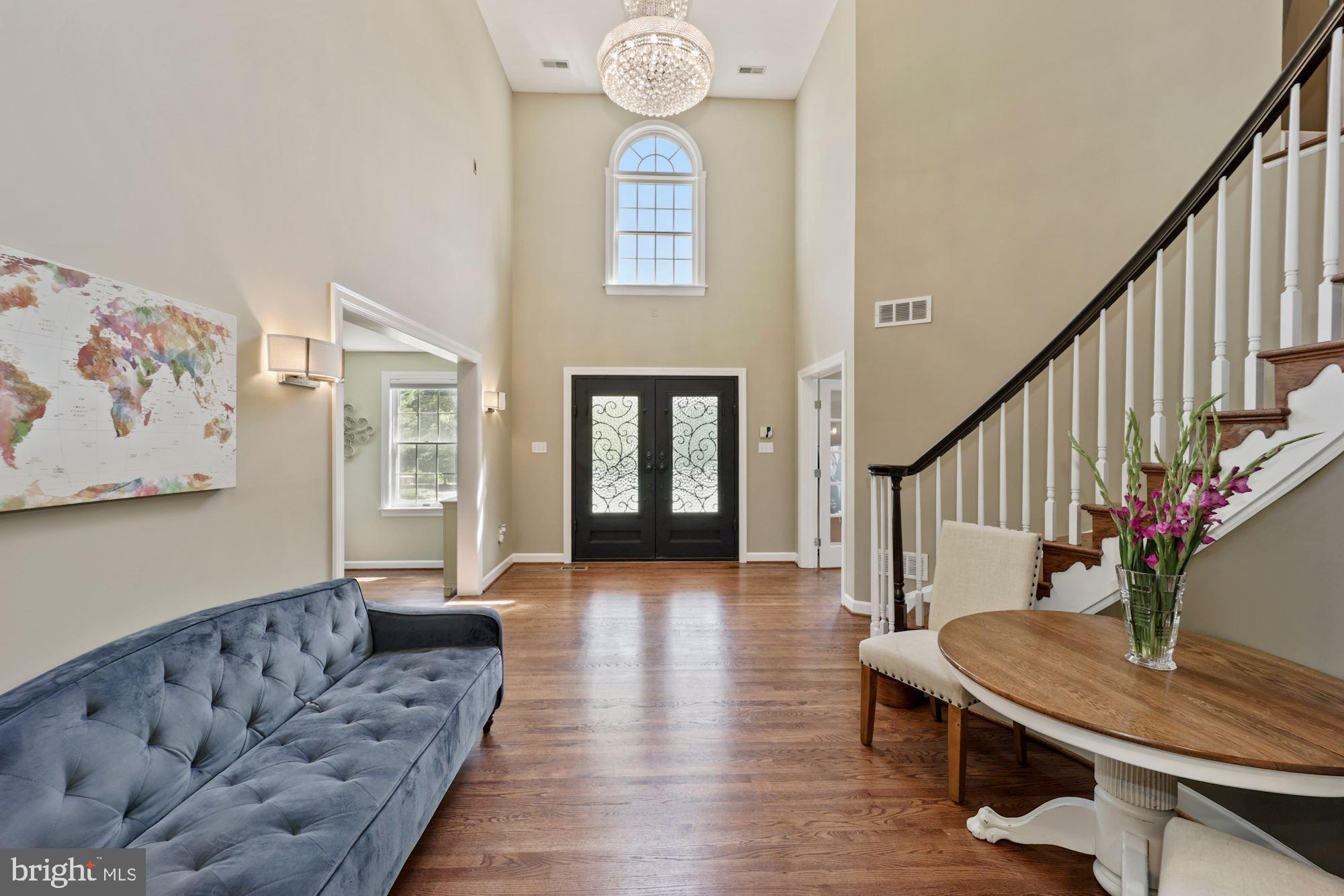 8100 Pinehurst Harbour Way Pasadena, MD 21122 - Photo 31 of 70 Fabulous chandelier, generously sized center hall