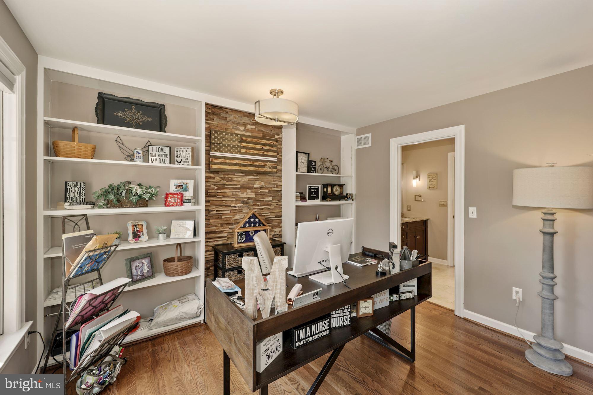 8100 Pinehurst Harbour Way Pasadena, MD 21122 - Photo 45 of 70 Office has built-in shelving & fabulous teak wall