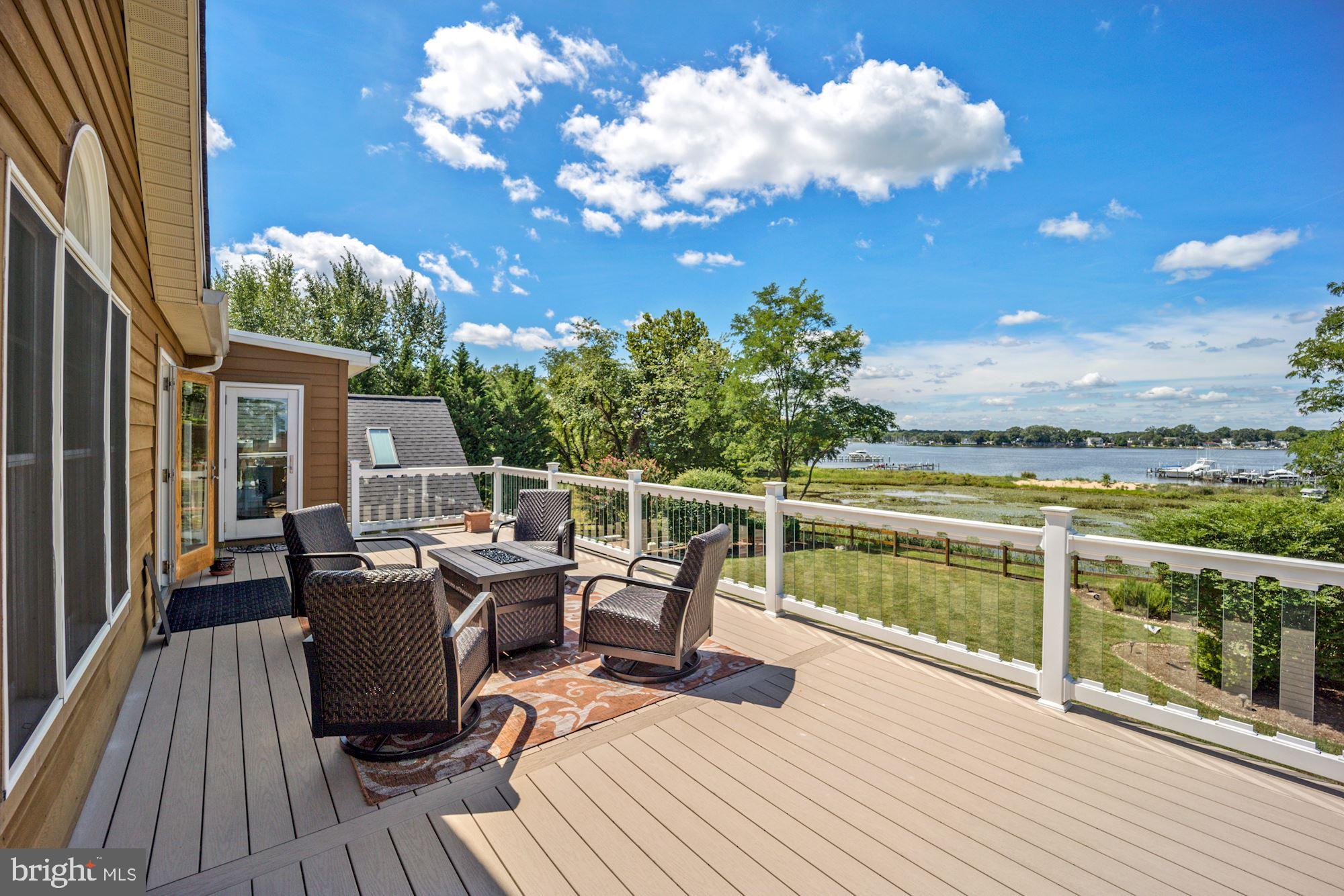 8100 Pinehurst Harbour Way Pasadena, MD 21122 - Photo 53 of 70 Upstairs wrap around deck off master bedroom