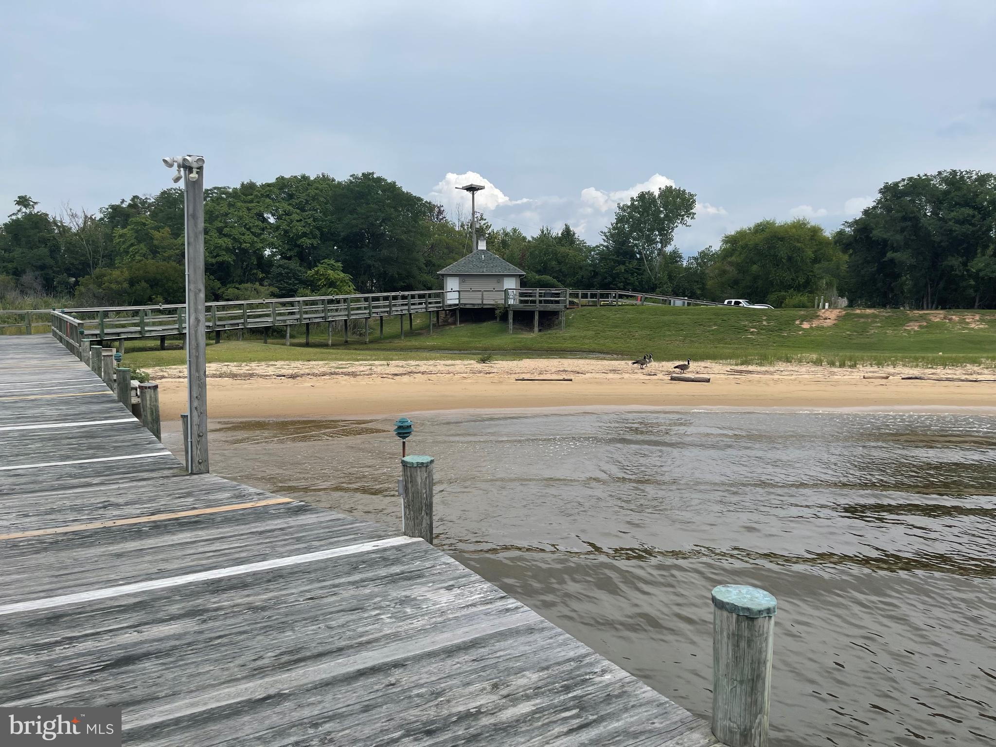 8100 Pinehurst Harbour Way Pasadena, MD 21122 - Photo 7 of 70 With a sandy beach-- 8100 owns 110 feet of it