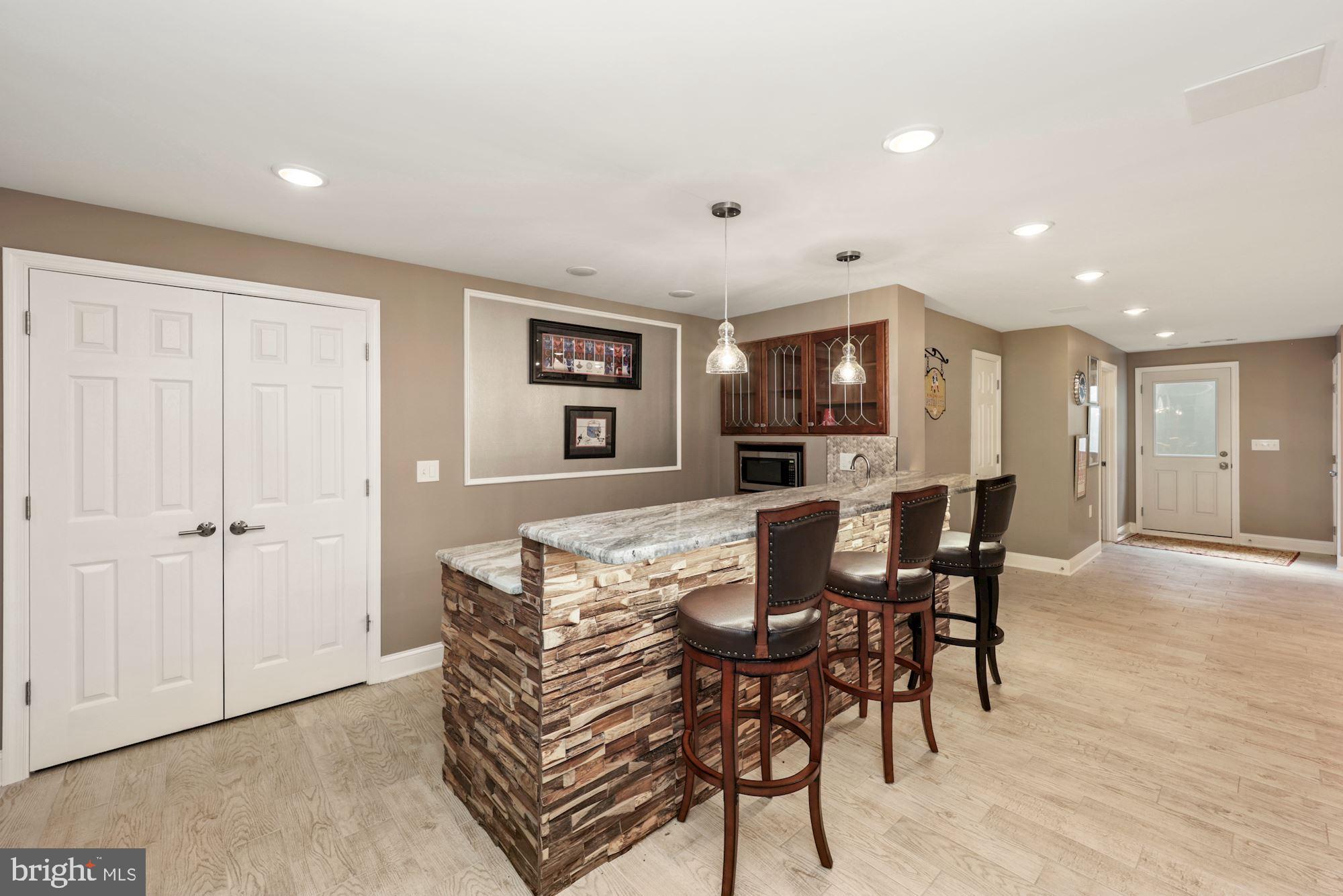 8100 Pinehurst Harbour Way Pasadena, MD 21122 - Photo 65 of 70 Lower Level Bar Area