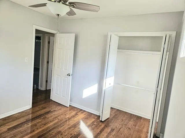 a view of entryway with wooden floor