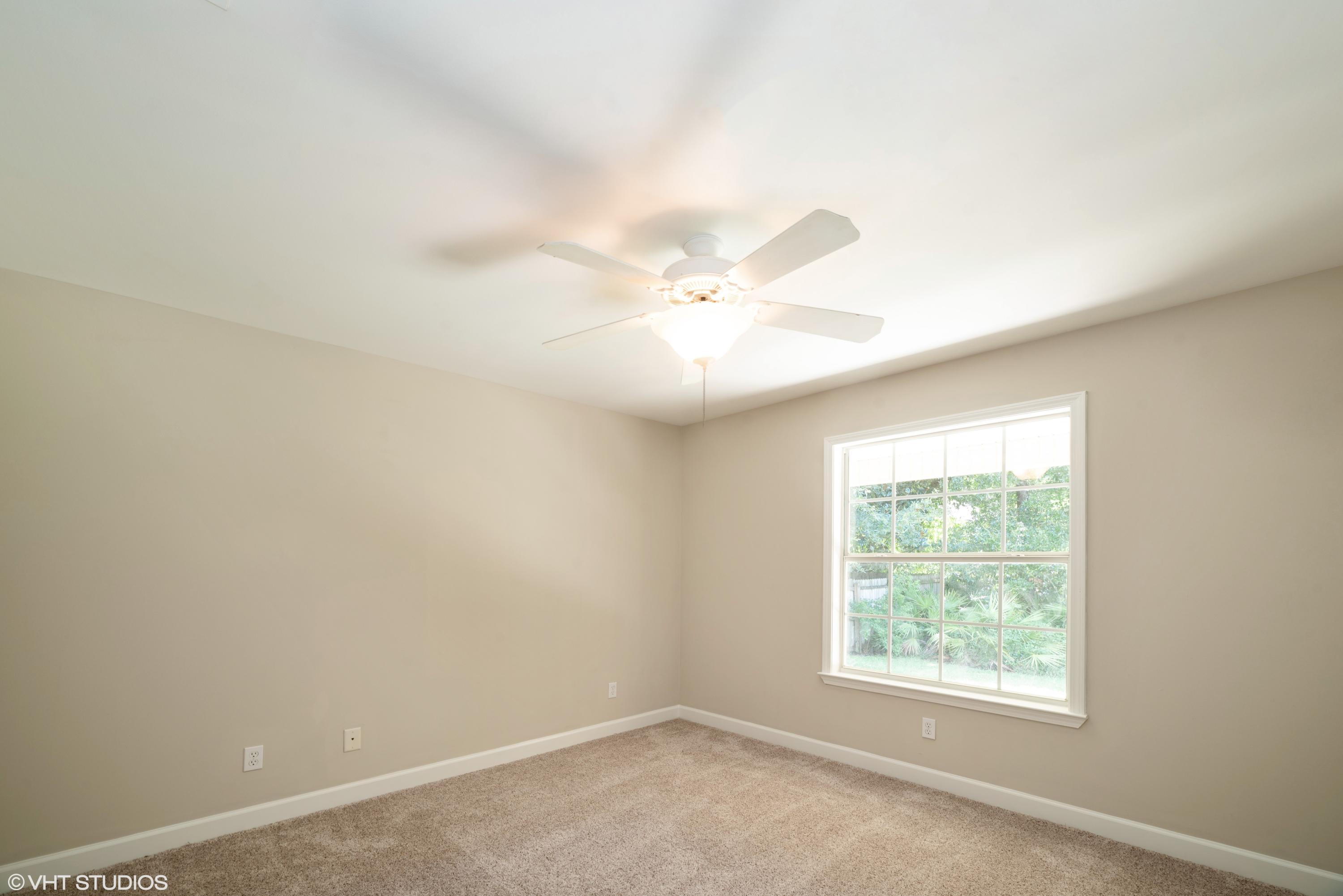 92 Central 7th Street Santa Rosa Beach, FL 32459 - Photo 19 of 25 an empty room with a window