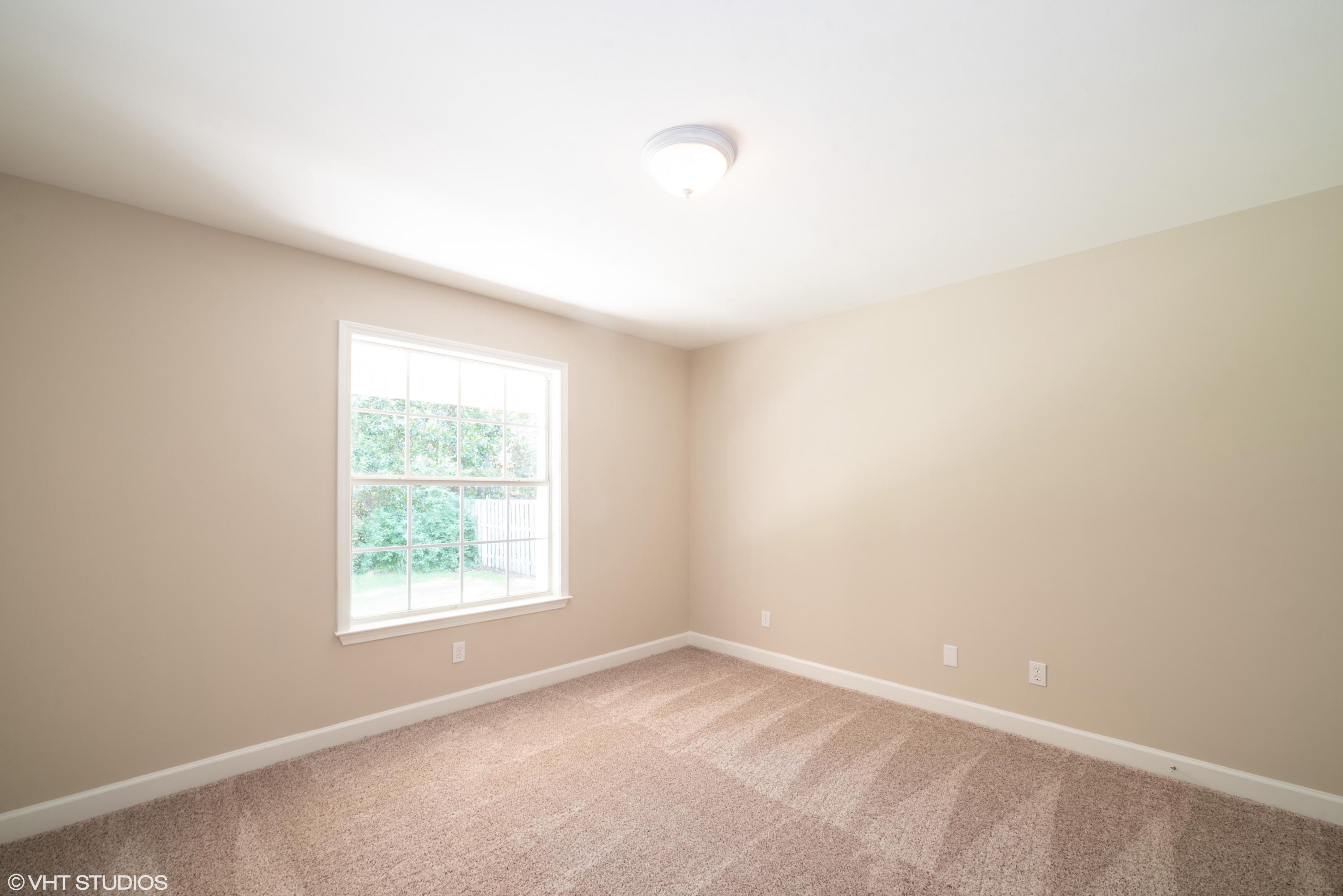 92 Central 7th Street Santa Rosa Beach, FL 32459 - Photo 22 of 25 an empty room with a window