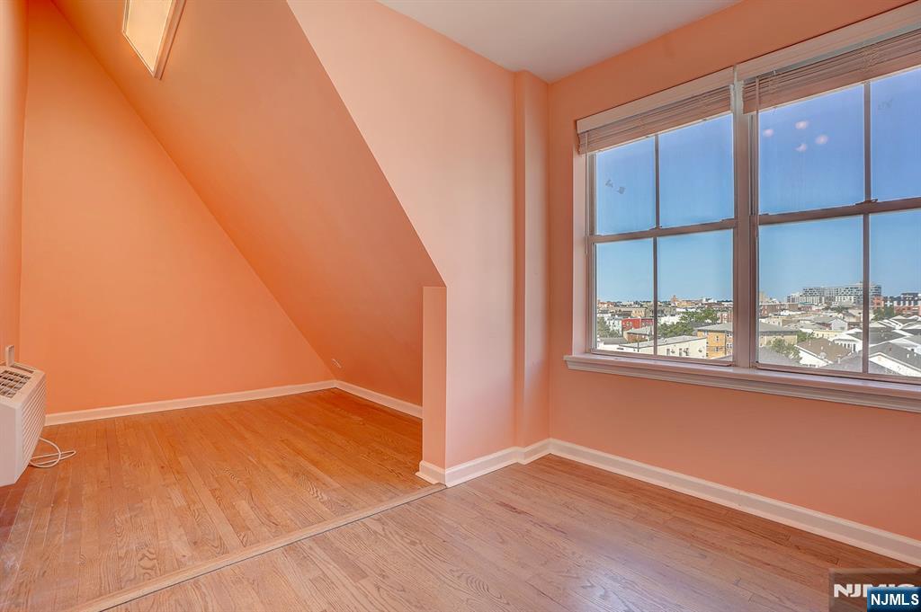 54 Polk Street, Unit P3 Newark, NJ 07105 - Photo 18 of 26 an empty room with a window