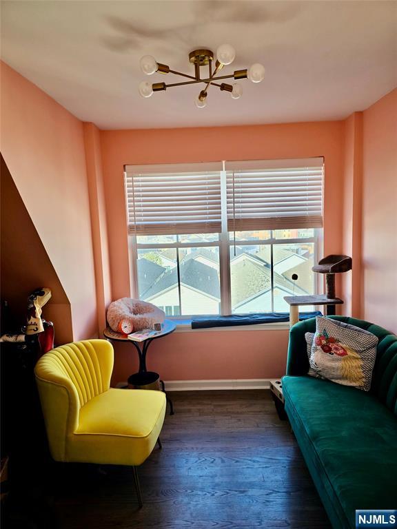 54 Polk Street, Unit P3 Newark, NJ 07105 - Photo 19 of 26 a living room with furniture and a large window