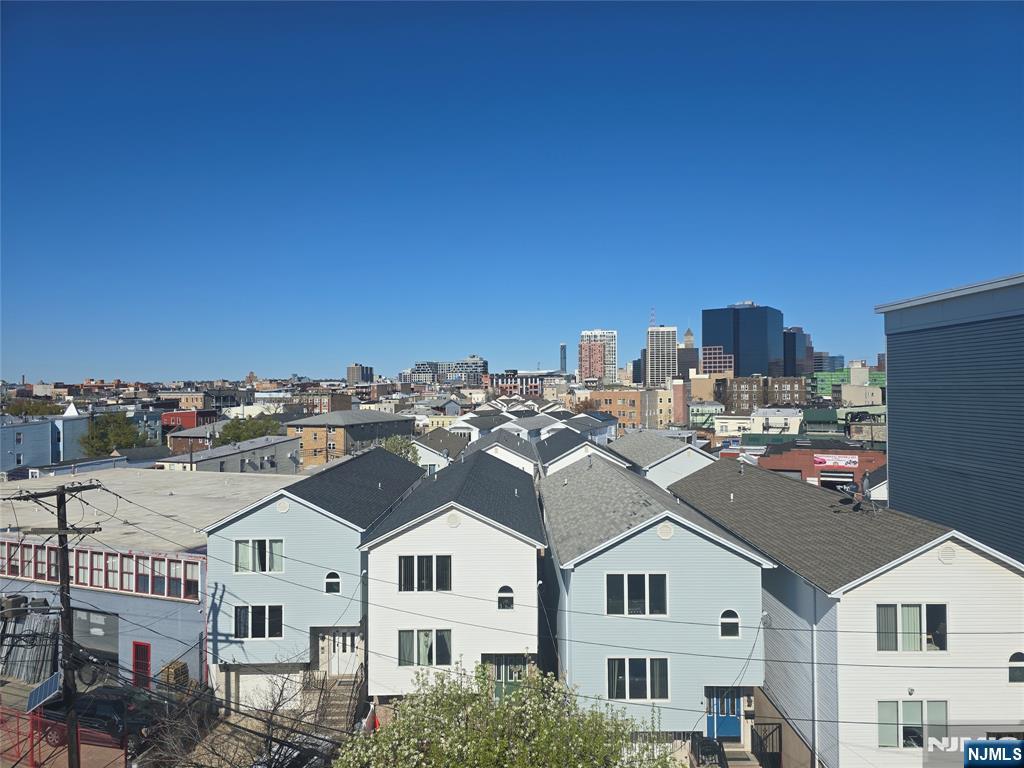 54 Polk Street, Unit P3 Newark, NJ 07105 - Photo 21 of 26 a aerial view of residential houses with city street