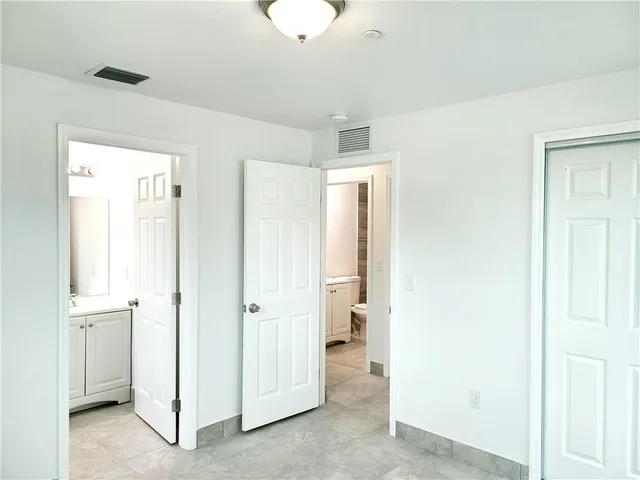 a view of a room with a wardrobe space
